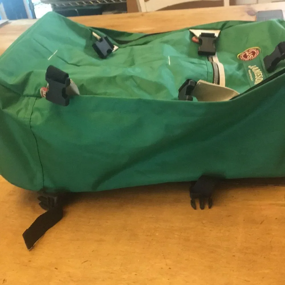 Jameson Green Travel Backpack with wheels and a retractable handle